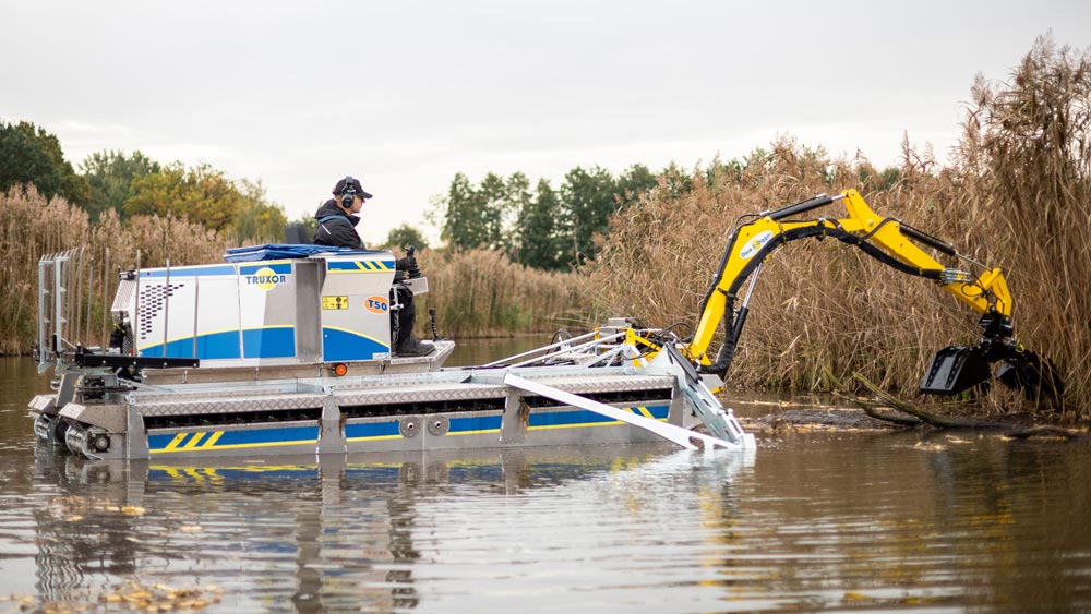 Truxor T50 amphibious machine operating in a lake
